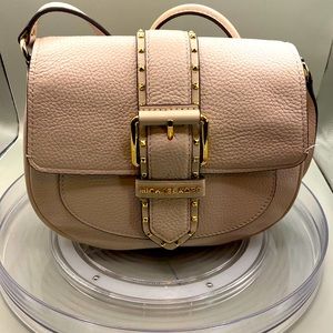Michael Kors crossbody purse in soft pink with gold accents